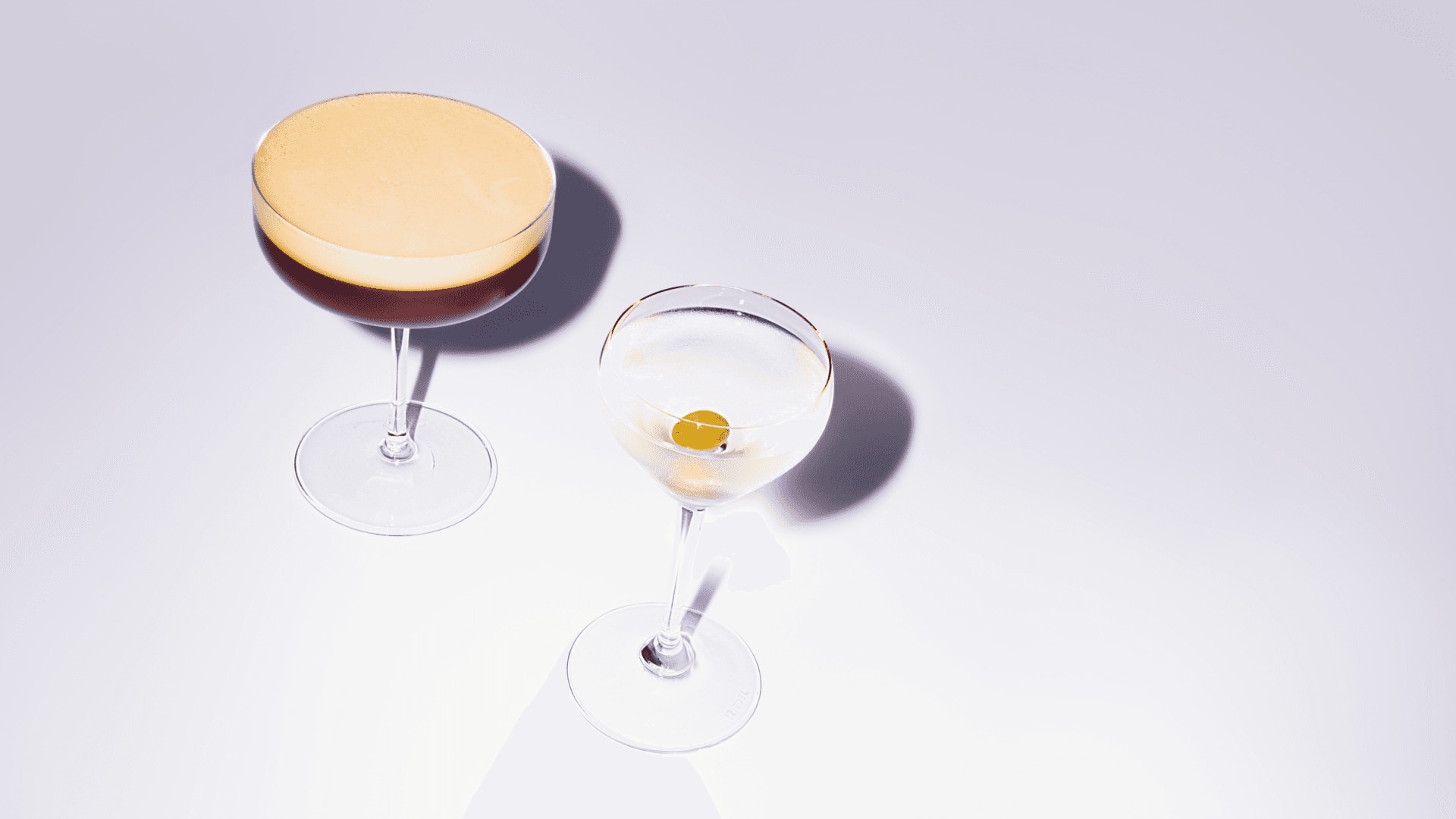An assortment of Belvedere vodka-based cocktails on a white backdrop