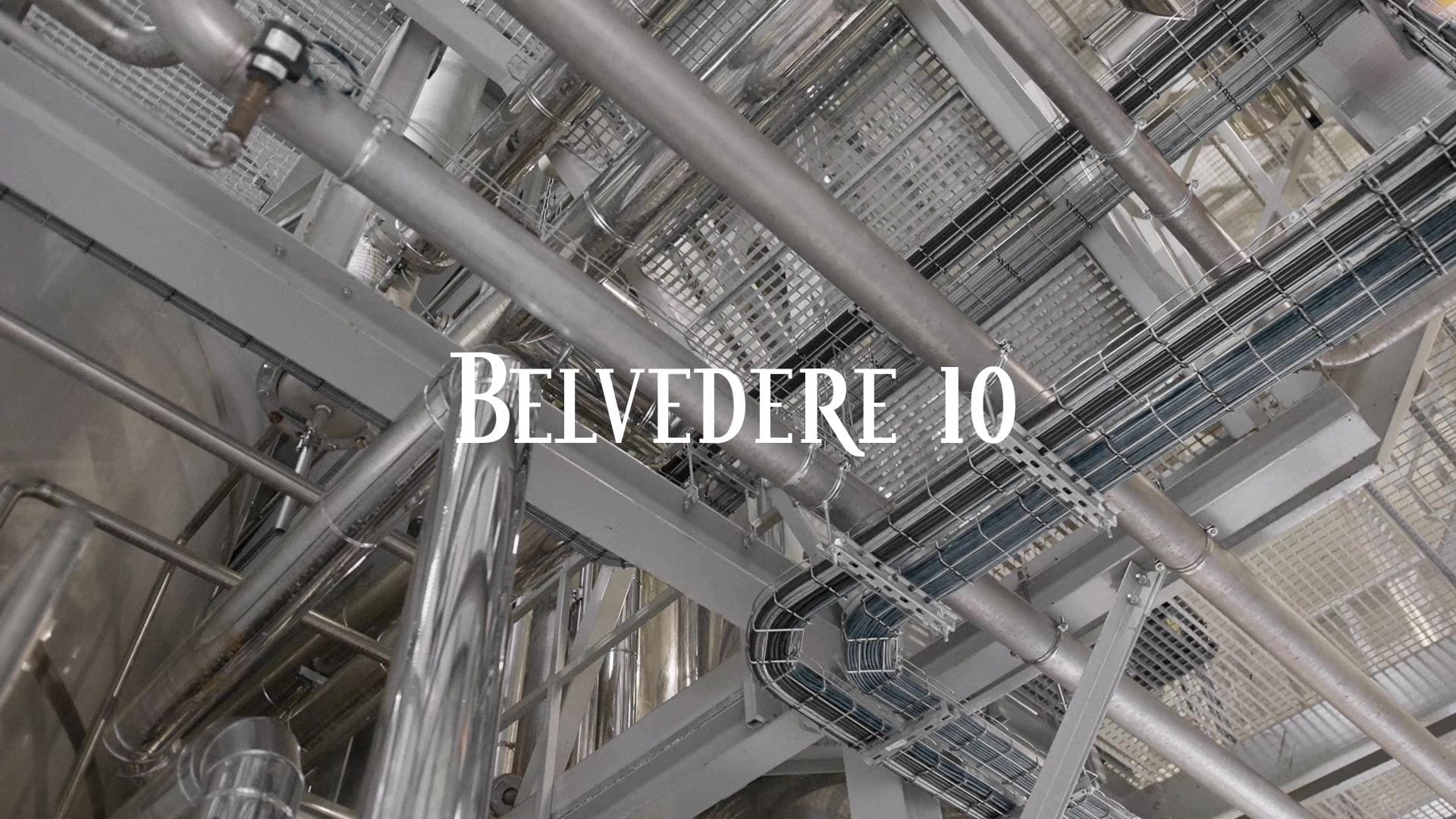 Stainless steel columns and walkways inside the Belvedere distillery, seen from below