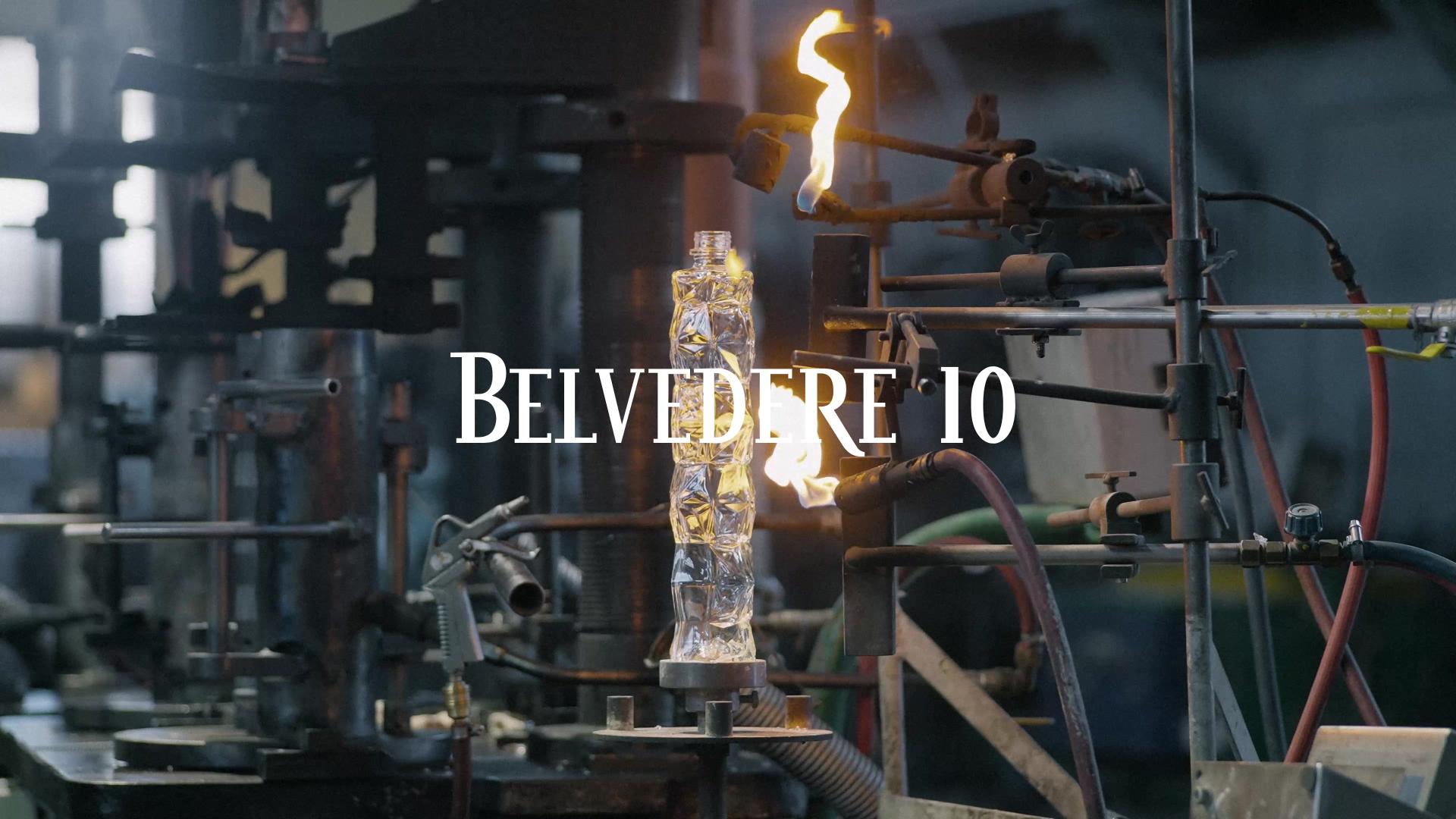 A sculpted Belvedere bottle turned in the flame at the glassworks