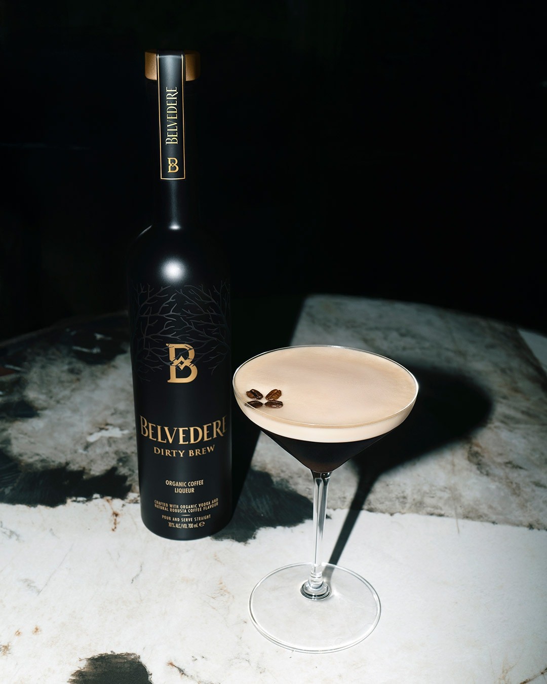 Dirty Brew bottle and Dirty Espresso cocktail on a table