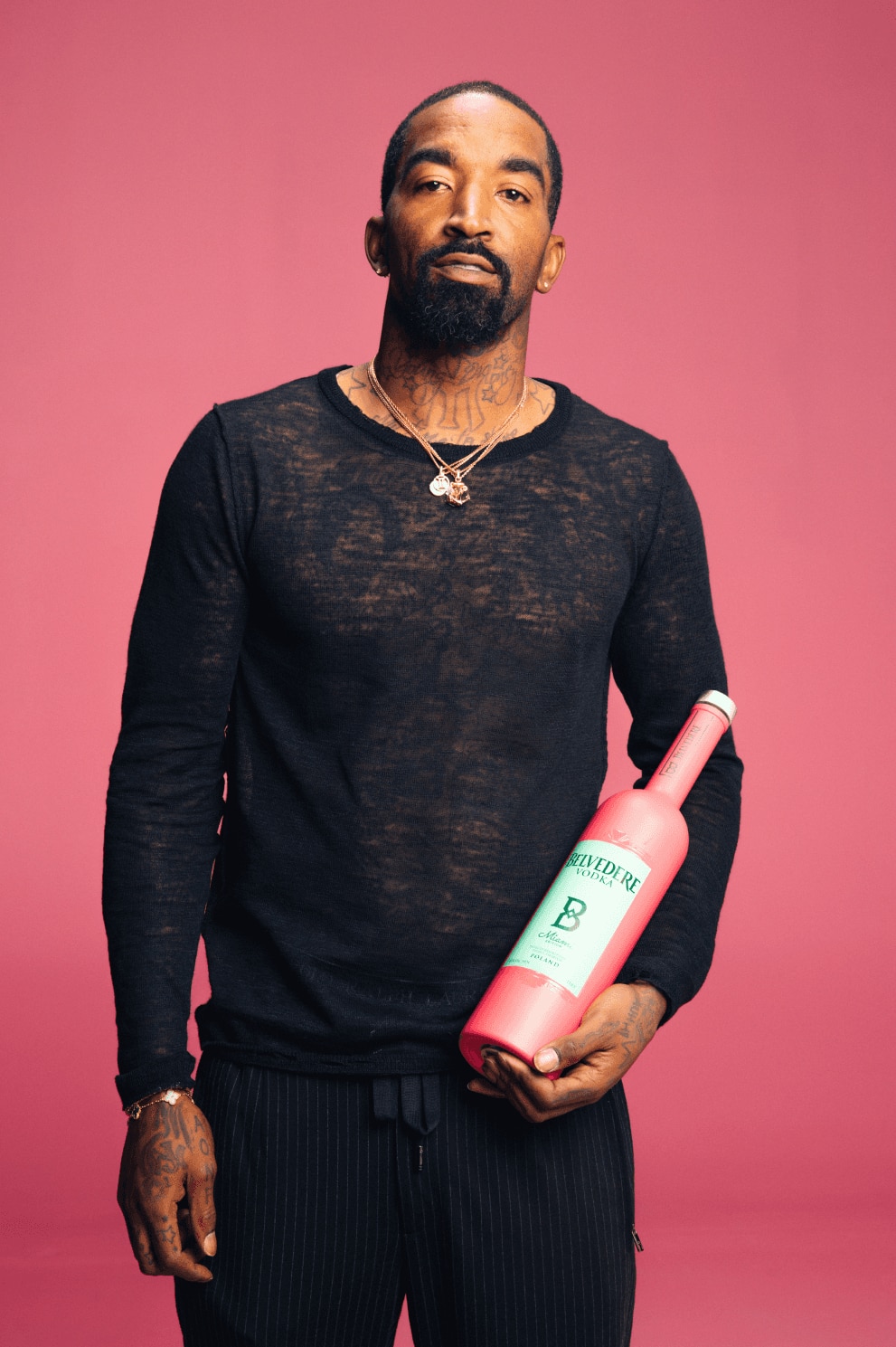 man holding miami pink bottle