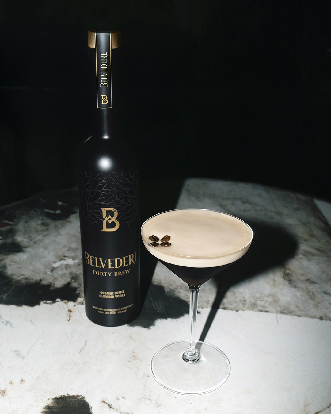 Dirty Brew bottle on a table and Espresso Dirty Brew cocktail